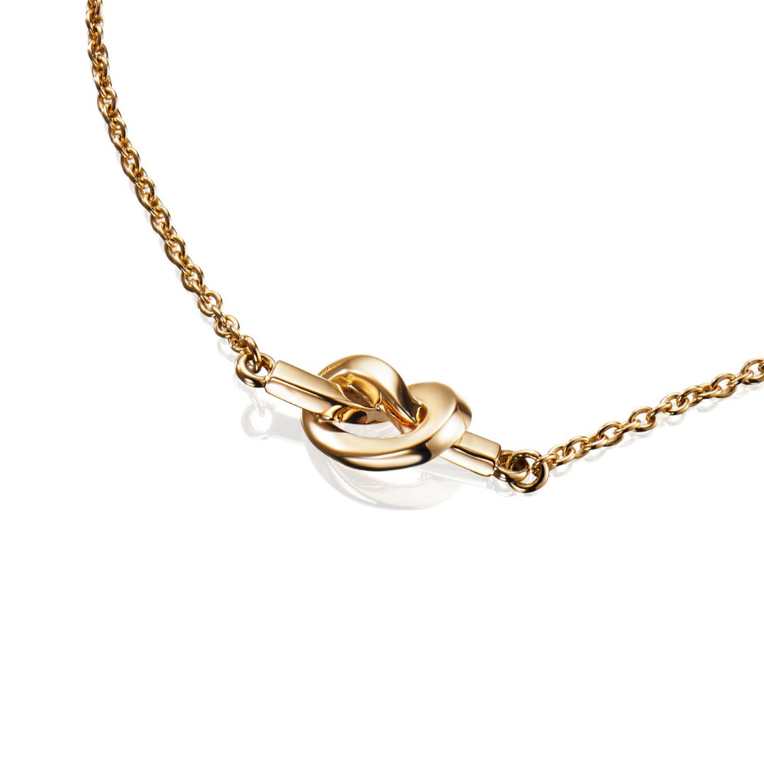 Efva Attling Love knot rannekoru, keltakultaa