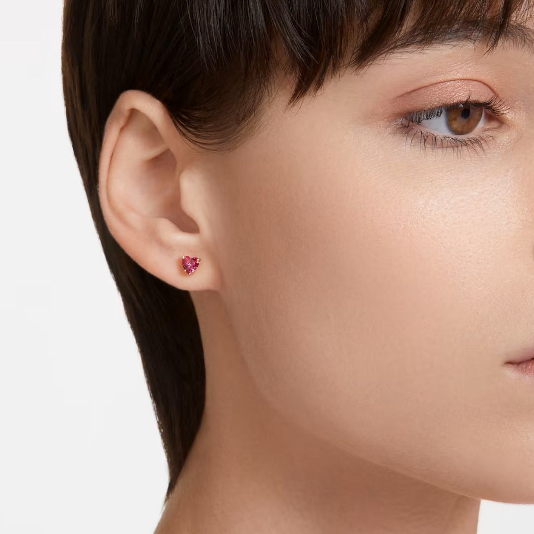 Swarovski Stilla korvakorut, keltakullan värinen ja punaiset kristallit