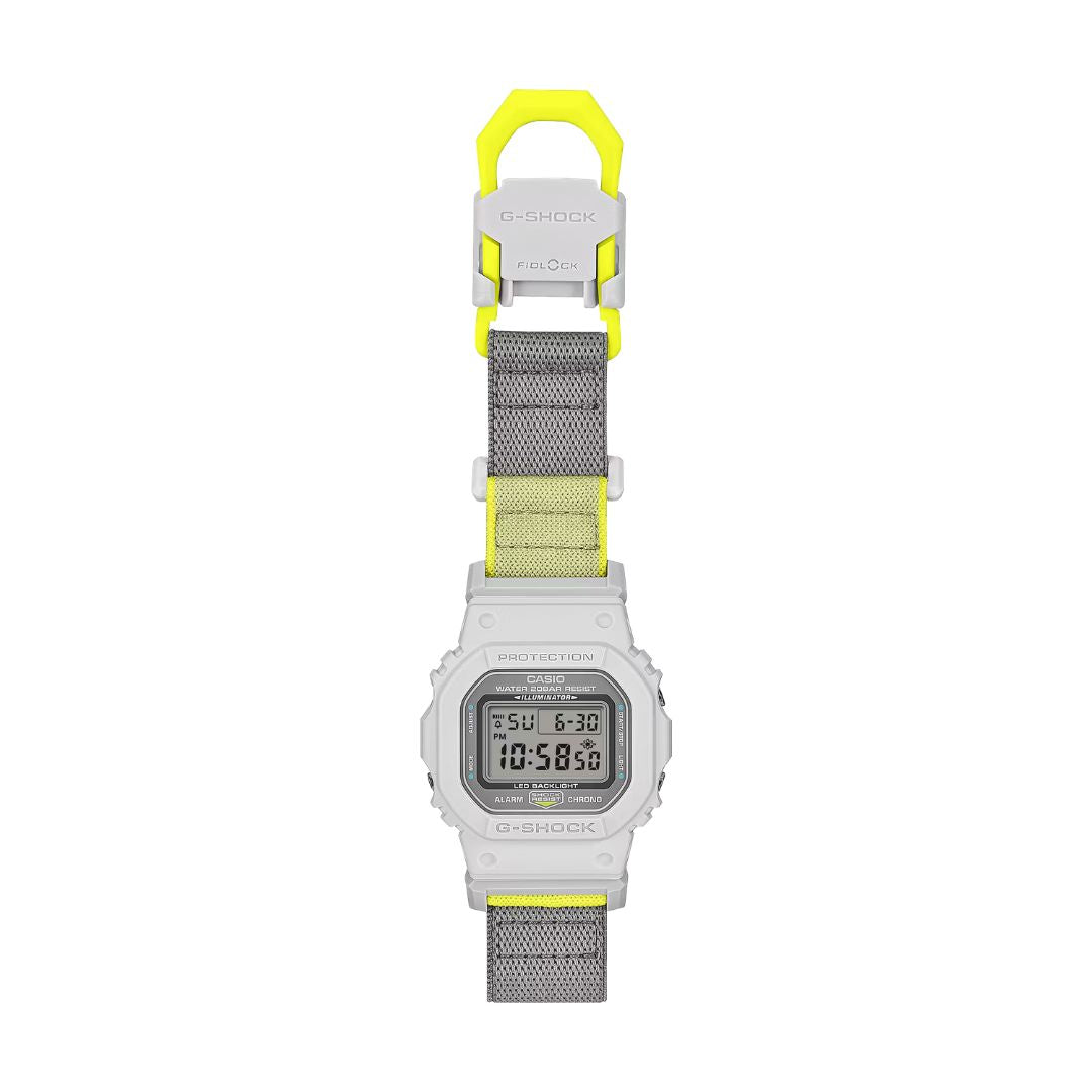 Casio G-Shock DW-5600MNC-7A8ER digitaalinen rannekello harmaalla kangasrannekkeella