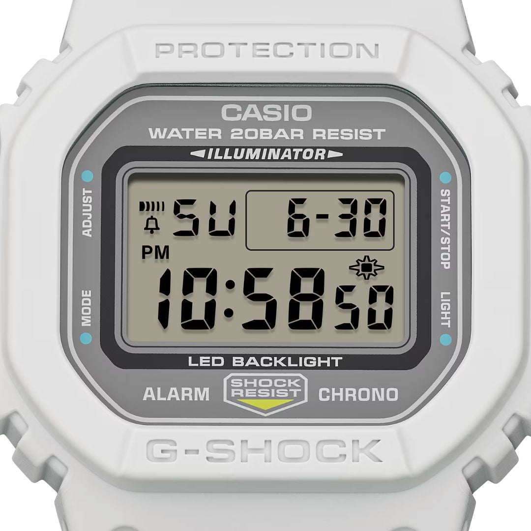 Casio G-Shock DW-5600MNC-7A8ER rannekello, digitaalinen näyttö ja valkoinen kuori