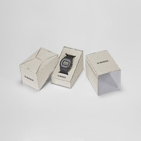 Casio G-Shock DW-5600RGM-1ER musta digitaalinen rannekello, tuotepakkaus