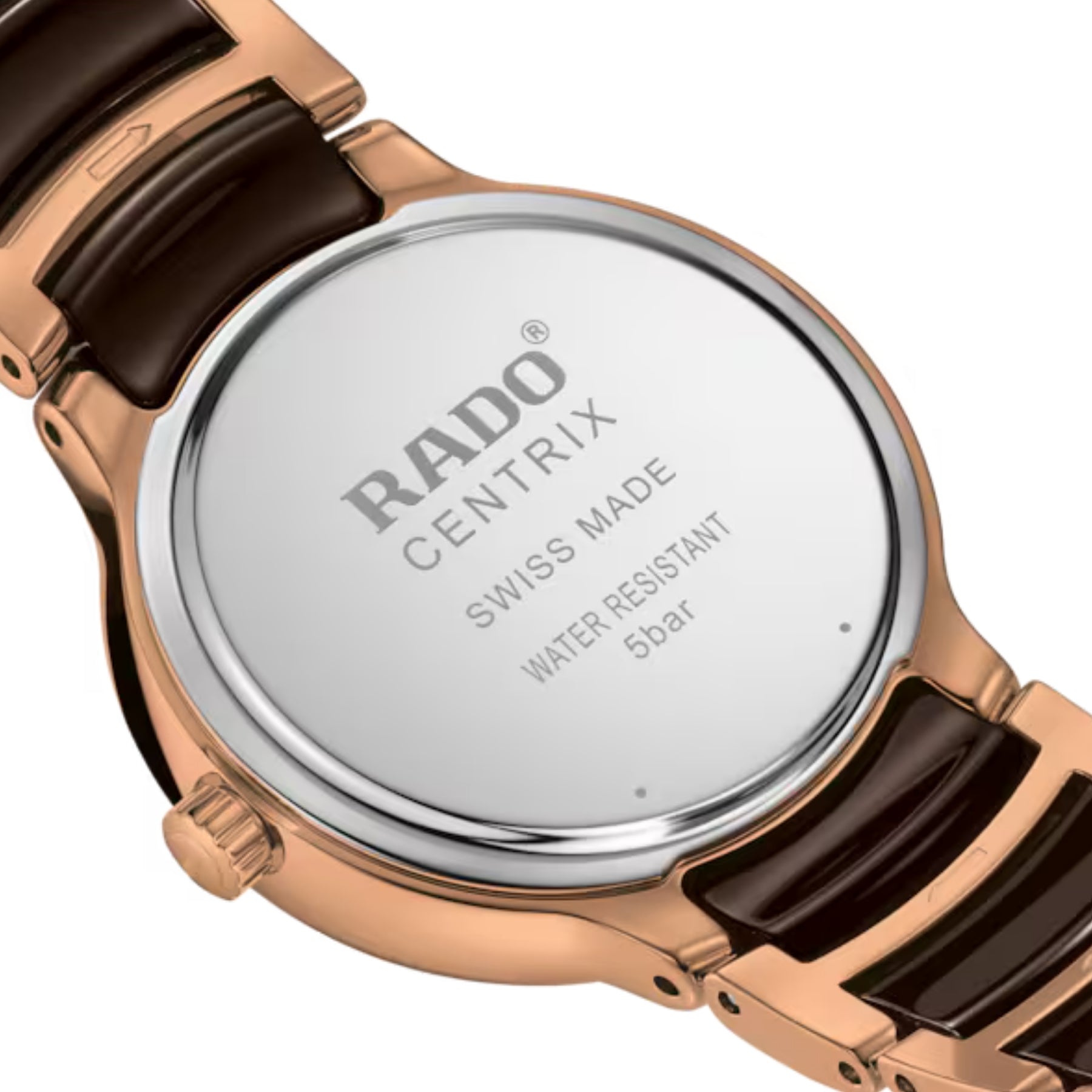 Rado-rannekellon ruusukullanvärinen takakansi, Swiss Made -merkintä, 5 bar vesitiiviys ja ruskea ranneke