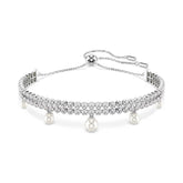 Swarovski x Ariana Grande rannekoru, vaalea metalli, kirkkaat kristallit ja valkoiset helmet 5720870