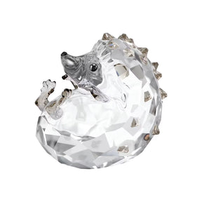 Swarovski kristallinen siilifiguuri, jossa on suloiset kasvot, koholla olevat tassut ja 519 valoa heijastavaa hiontaviistettä