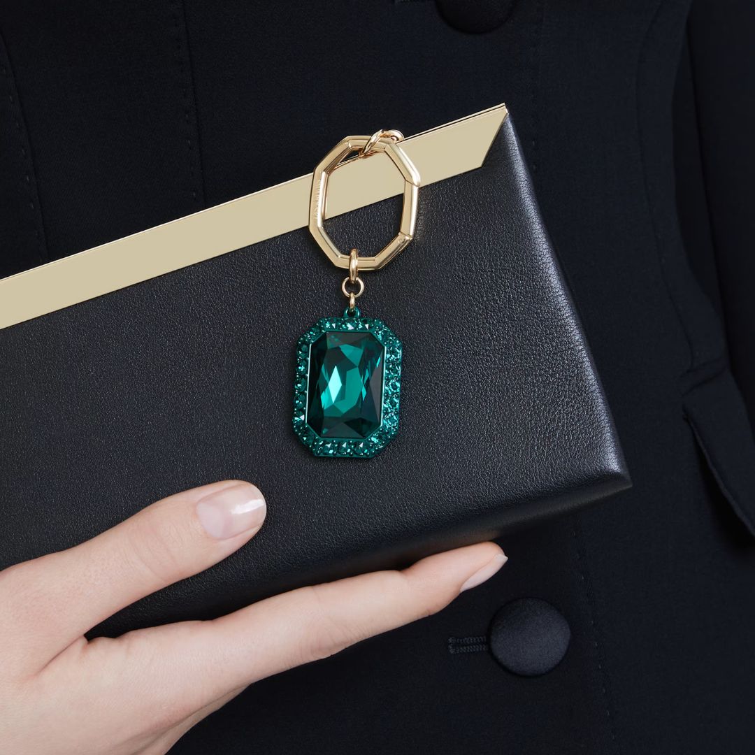 Swarovski Infinity avaimenperä, keltakullanvärinen, vihreät kristallit 5666643