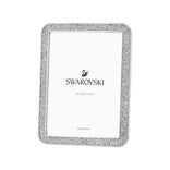 Hopeanvärinen Swarovski-kehys 10 x 15 cm koolle, pyöristetyt reunat ja säihkyvä kristallikoristelu.