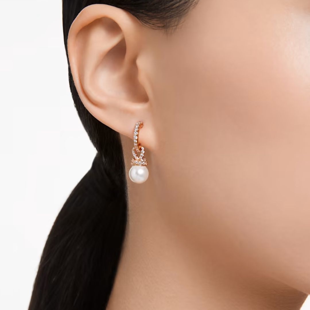Swarovski Originally korvakorut, ruusukullan värinen ja kirkkaat kristallit 5669524