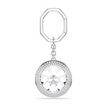 Swarovski Una -laukku- ja avainkoru vaaleaa rodinoitua metallia, suuri kirkas kristalli ja säihkyvä pavé-istutus.
