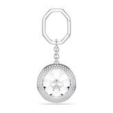 Swarovski Una -laukku- ja avainkoru vaaleaa rodinoitua metallia, suuri kirkas kristalli ja säihkyvä pavé-istutus.