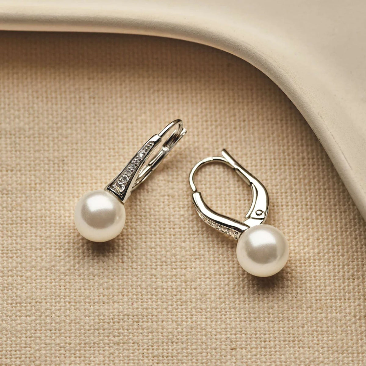 TI SENTO korvakorut, hopeaa, zirkonit ja valkoiset helmet, 78061PW