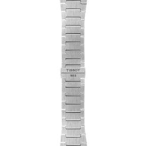 Tissot rannekellon hopeanvärinen teräsranneke ja Tissot 1853 kaiverrettu solki