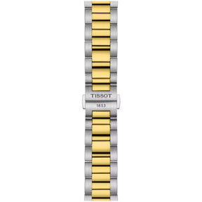 Tissot-rannekellon kaksivärinen teräsranneke ja taittolukko, jossa näkyy Tissot 1853 -kaiverrus